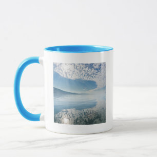 USA, Alaska, Freshwater Bay. Clouds Reflected Mug