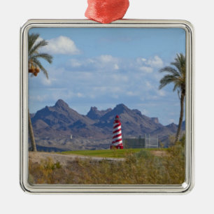 USA, Arizona, Lake Havasu City. Lighthouse next Metal Tree Decoration