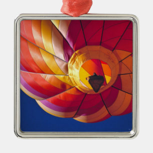 USA, Arizona, Val Vista. A colourful hot-air Metal Tree Decoration