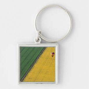 USA, Arizona, Val Vista. Hot-air balloons soar Key Ring