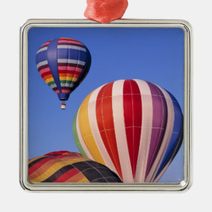 USA, Idaho, Teton Valley. Colourful hot-air Metal Tree Decoration