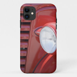 USA, Maine, Owl's Head. Headlight and partial iPhone 11 Case