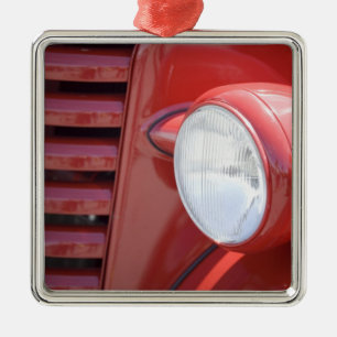 USA, Maine, Owl's Head. Headlight and partial Metal Tree Decoration