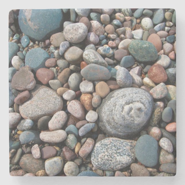 USA, Michigan. Polished Pebbles On The Shore Stone Coaster (Front)
