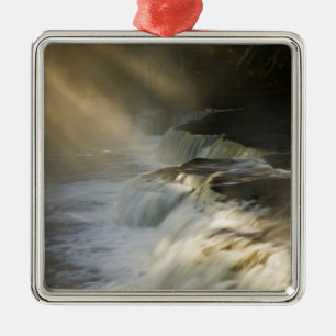 USA, Michigan, Upper Peninsula. Sunbeams on Metal Tree Decoration
