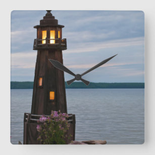 USA, Michigan. Yard Decoration Lighthouse Square Wall Clock
