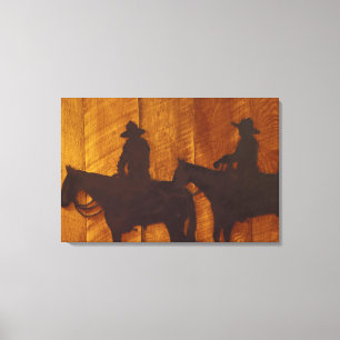 USA, Montana, Boulder River Cowboys on horses Canvas Print