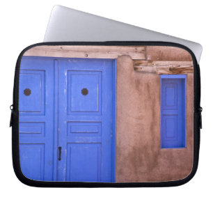 USA, New Mexico, Santa Fe. View of blue door and Laptop Sleeve