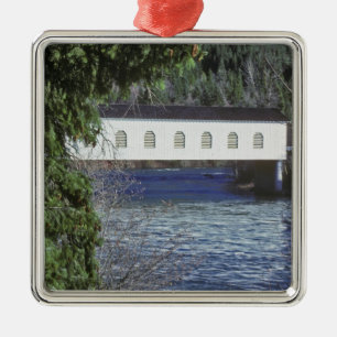 USA, Oregon. A pick-up crossing the Metal Tree Decoration