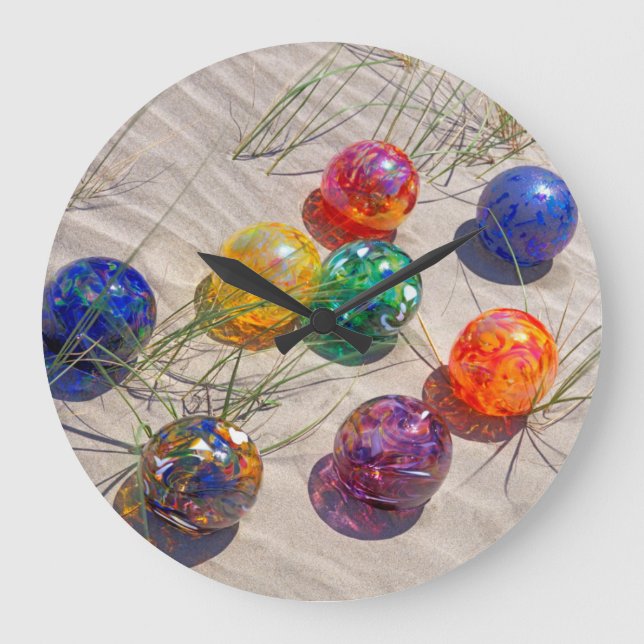 USA, Oregon. Colourful Glass Floats On Sand Dune Large Clock (Front)