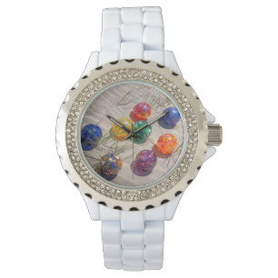 USA, Oregon. Colourful Glass Floats On Sand Dune Watch