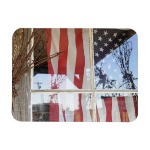 USA, Oregon, Shaniko. Flag in window next to Magnet