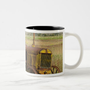 USA, Oregon, Shaniko. Rusty vintage tractor in Two-Tone Coffee Mug