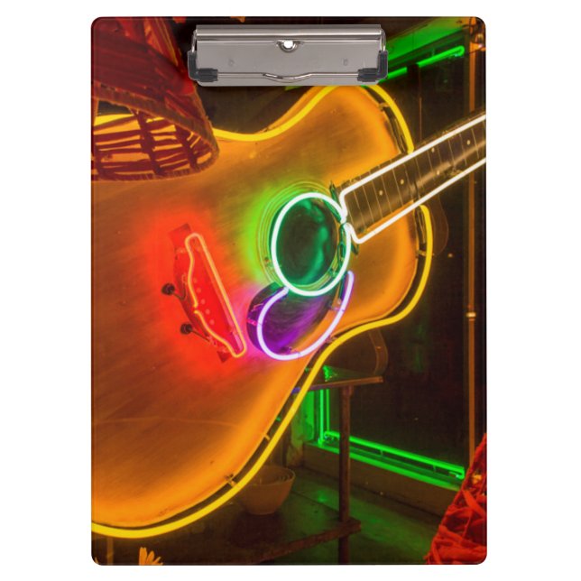 USA, Texas, Austin. Neon Guitar At Blackmail Clipboard (Front)