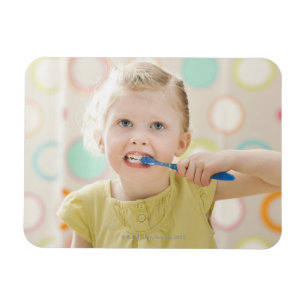 USA, Utah, Lehi, girl (2-3) brushing teeth Magnet
