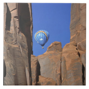 USA, Utah, Monument Valley. A rainbow hot-air Tile