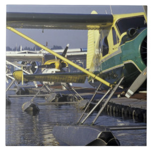 USA, Washington, Seattle, Seaplanes docked on Tile