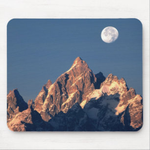 USA, Wyoming, Grand Teton NP. A full moon sets Mouse Mat