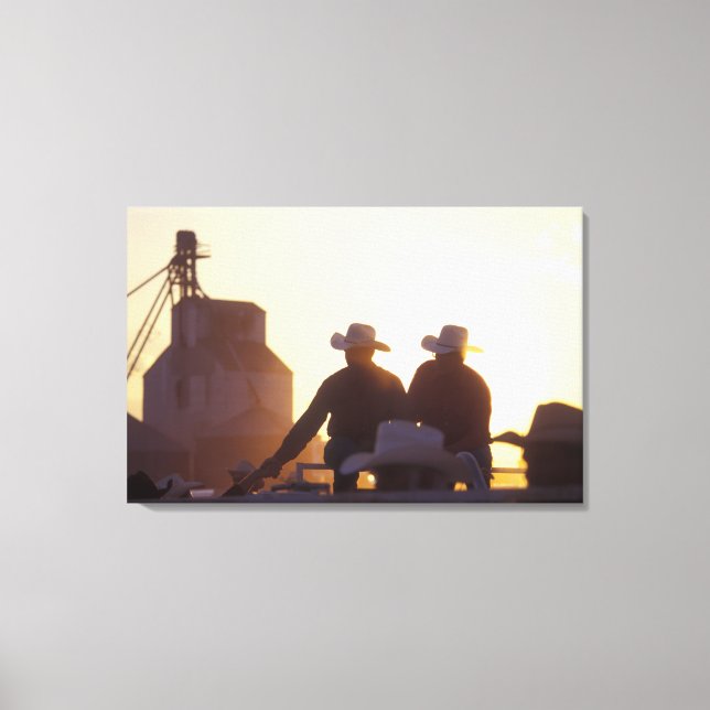 USA, Wyoming, Pine Bluffs. Two men shake Canvas Print (Front)