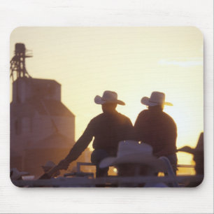 USA, Wyoming, Pine Bluffs. Two men shake Mouse Mat