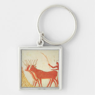 Using cows to trample wheat key ring