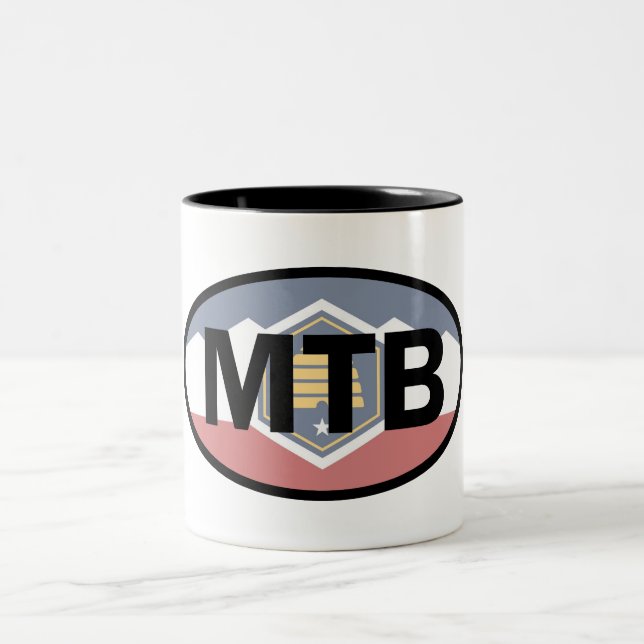 Utah Flag Mountain Biking Oval Two-Tone Coffee Mug (Center)