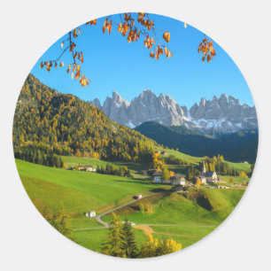 Val di Funes valley with fall leaves round sticker