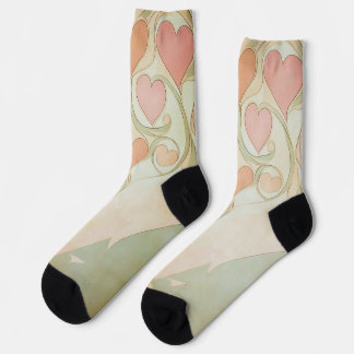 Valentine hearts background in pale pink and green socks
