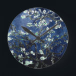 Van Gogh Almond Blossoms Midnight Blue Round Clock<br><div class="desc">Artist: Vincent Van Gogh
Title: Almond Blossoms
Altered colour by 2sweet4wordsDesigns</div>