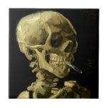Van Gogh Smoking Skeleton Tile<br><div class="desc">Ceramic Tile featuring Vincent van Gogh’s oil painting Skull of a Skeleton with Burning Cigarette (1885-86). A great gift for fans of Post-Impressionism and Dutch art!</div>
