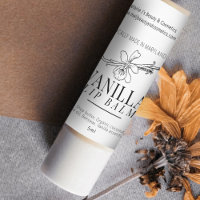 Vanilla flower and bean drawing lip balm product