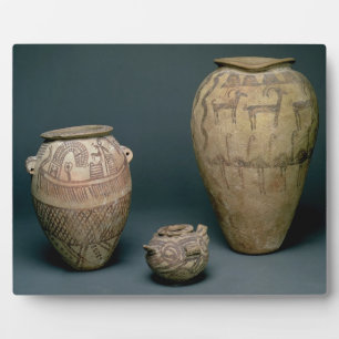 Vase decorated with various friezes of animals and plaque