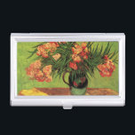 Vase with Oleanders and Books by Vincent van Gogh Business Card Holder<br><div class="desc">Still Life: Vase with Oleanders and Books by Vincent van Gogh is a vintage fine art post impressionism still life floral painting. A beautiful bouquet of oleander flowers from a spring garden and library books for leisure reading on a table. About the artist: Vincent Willem van Gogh (1853 -1890) was...</div>