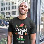 Vegan elf family matching christmas outfit name T-Shirt<br><div class="desc">Get into the holiday spirit with this fun Vegan elf t-shirt which is part of a matching family elf outfit collection containing gifts for any member of the family. Perfect for any Christmas family reunion, or as a family matching pajama, this t-shirt features a cute elf hat and legs, with...</div>