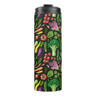 Vegetable and herbs garden harvest on black thermal tumbler