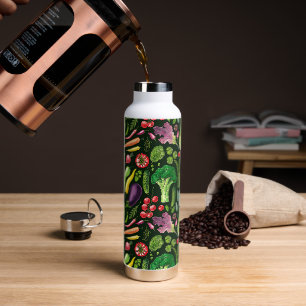 Vegetable and herbs garden harvest on black water bottle