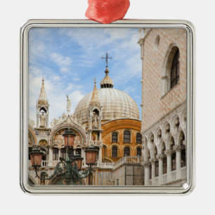 Venice, Veneto, Italy - Birds are perched on a Metal Tree Decoration