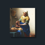 Vermeer The Milkmaid Canvas Wrap Print<br><div class="desc">Johannes Vermeer The Milkmaid canvas wrap. Oil painting on canvas circa 1660. A beautiful depiction of a Dutch kitchen, Vermeer’s The Milkmaid captures middle class northern European life with grace and mastery. The milkmaid pours milk from one jar into a larger pot surrounded by various loaves of fresh bread, a...</div>