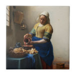 Vermeer The Milkmaid Tile<br><div class="desc">Johannes Vermeer The Milkmaid tile. Oil painting on canvas circa 1660. A beautiful depiction of a Dutch kitchen, Vermeer’s The Milkmaid captures middle class northern European life with grace and mastery. The milkmaid pours milk from one jar into a larger pot surrounded by various loaves of fresh bread, a blue...</div>