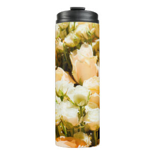 Vertical pattern of white roses. anniversary, back thermal tumbler