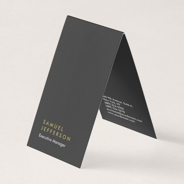 Vertical special black professional plain modern business card (Front)