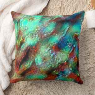 Very mottled abstract texture in green red shades cushion