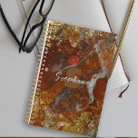 Vibrant Abstract Planner with a Touch of Sparkle<br><div class="desc">Introducing our customisable planner with a vibrant and eye-catching cover! The abstract design features a stunning mix of red, orange, and gold colours with white and black accents, creating a marbled or fluid art appearance. The cover is further enhanced with scattered gold glitter, adding a touch of sparkle to your...</div>