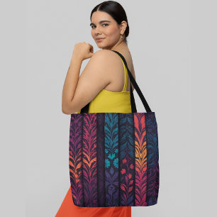Vibrant and intricate floral pattern with leaves tote bag