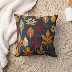 Vibrant autumn leaves on a deep green backdrop cushion