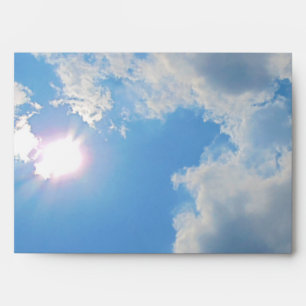 Vibrant blue sky with sun and clouds photo envelopes