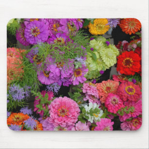 Vibrant coloured daisies mouse mat