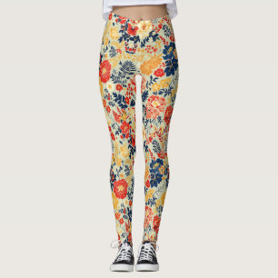 Vibrant flora red, yellow and blue on white leggings