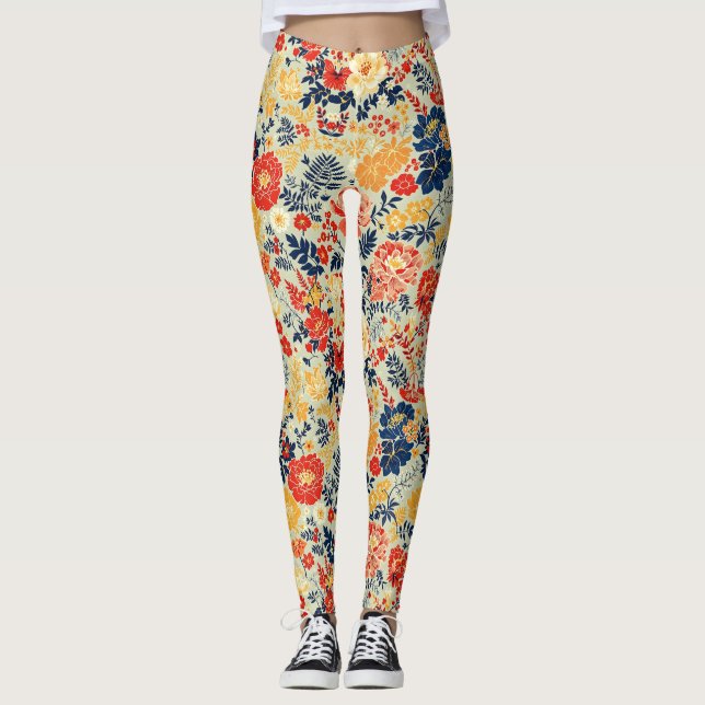 Vibrant flora red, yellow and blue on white leggings (Front)