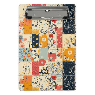 Vibrant Floral Patchwork Quilt in Warm Tones Mini Clipboard